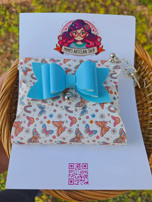 coin purse with butterfly accents and a cute blue bow